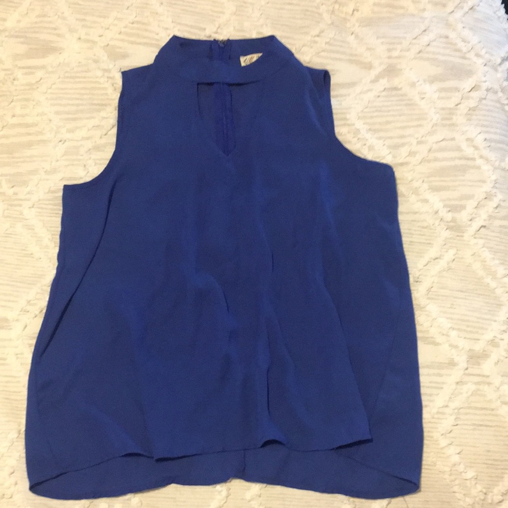 Blue top with chest cut out.